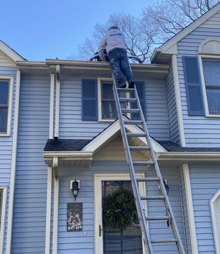 Gutter cleaning work detail by The Powerwash Guys