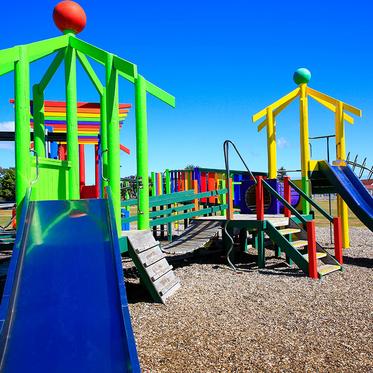 Playground power washing work — municipal play equipment